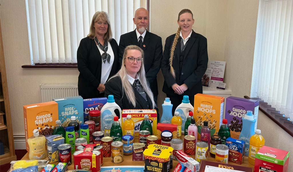 The Diamond & Son Funeral Directors team delivering supplies to the New Forest Basics Foodbank.